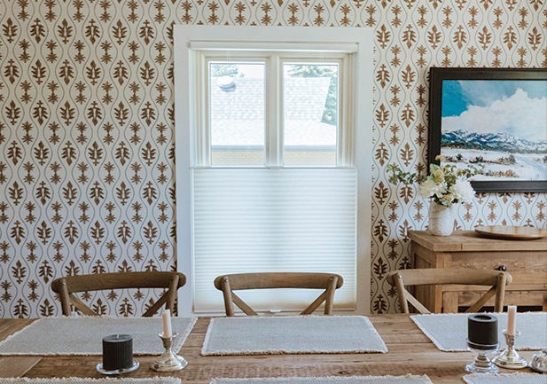 after view of living room with custom window treatments