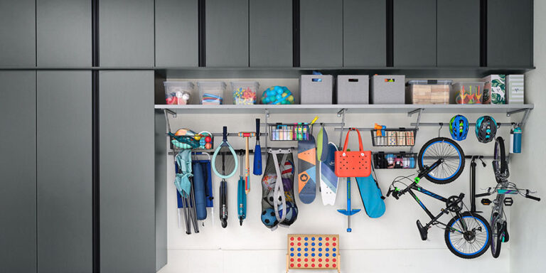 Custom garage cabinets and organization system designed for Colorado home