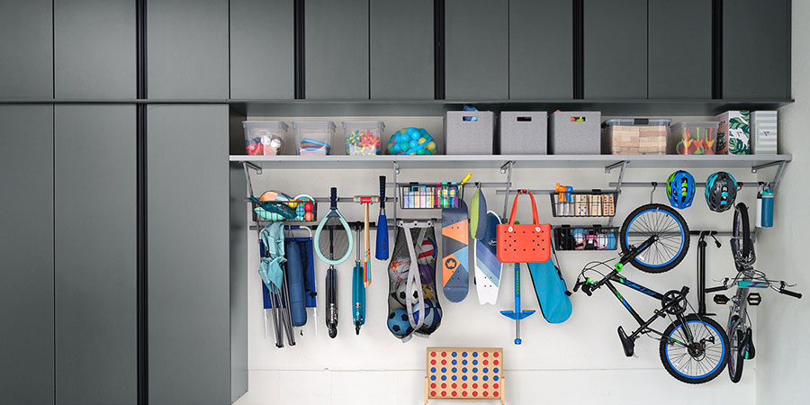 Custom garage cabinets and organization system designed for Colorado home