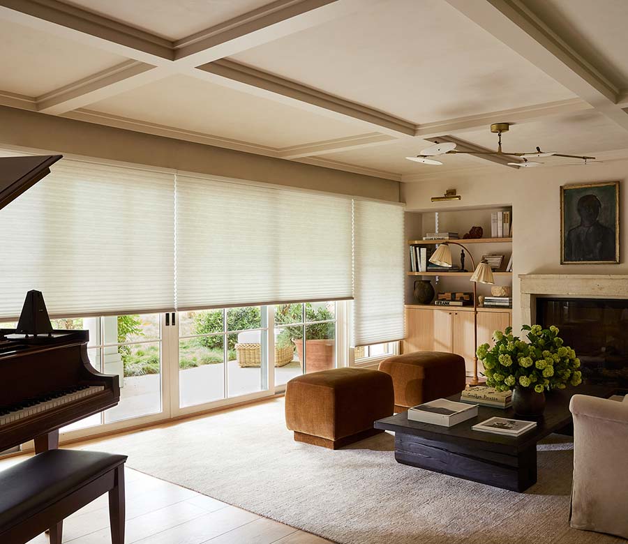 Hunter-douglas-Duette-Honeycomb-Shades-rocky-mountain-shutters-shades-and-closets White Duette Honeycomb Shades providing light control in a living room