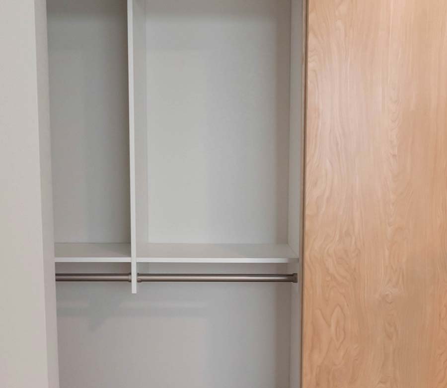 Longmont-CO-Bedroom-Closet-Double-Hang-Bars-Custom-Storage-Rocky-Mountain-Shutters-Shades-Closets Arctic White reach-in closet with hanging space and built-in storage in Longmont