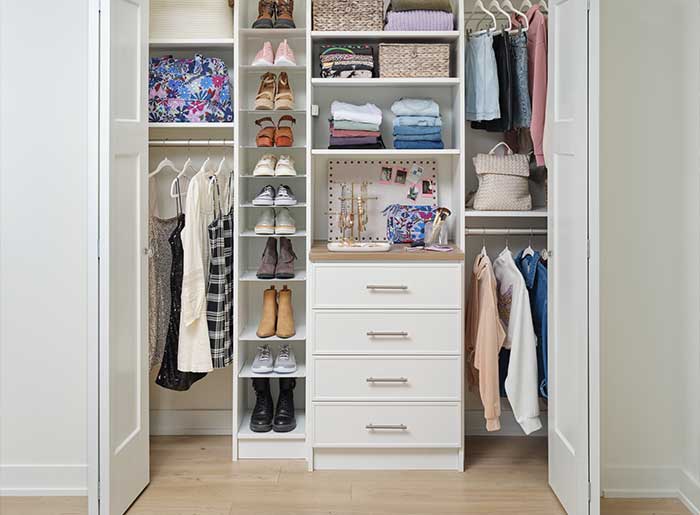 rocky-mountain-shutters-shades-closets-reach-in-closet Walk-in closet organization system with double hanging space and adjustable shelving