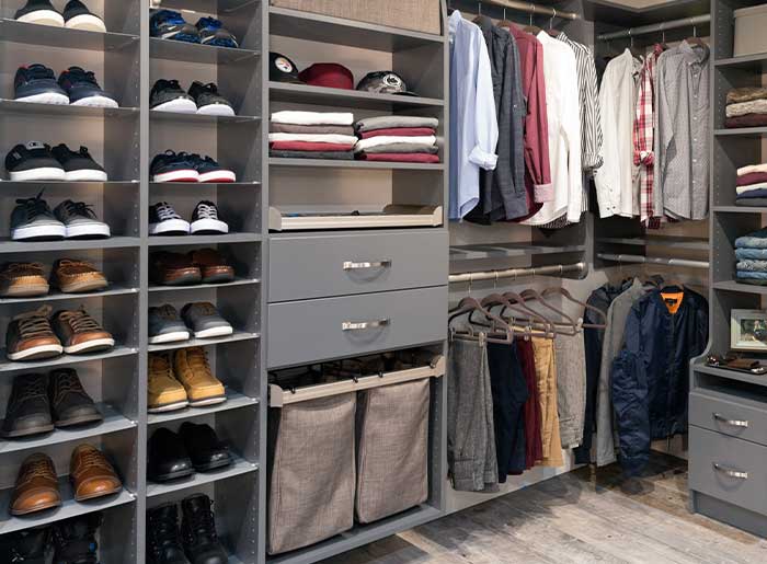 rocky-mountain-shutters-shades-closets-walk-in-closet Custom walk-in closet with built-in shelving, drawers, and hanging storage