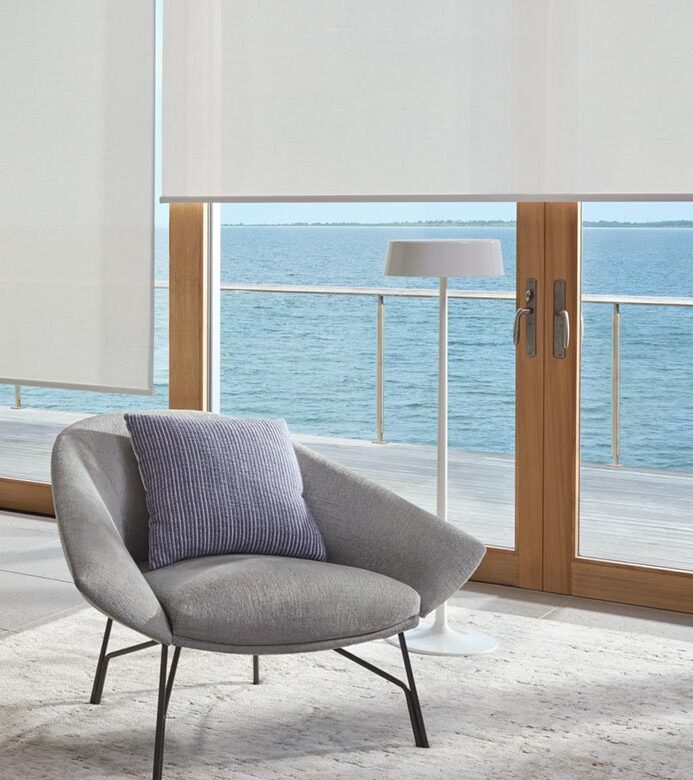 white shades on living room sliding glass doors