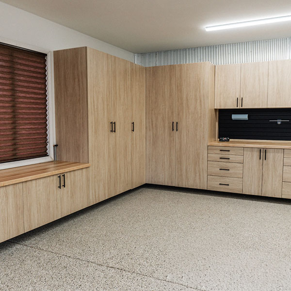 after-garage-srorage-cabinets-drawers-parker-colorado-by-rocky-mountain-shutters-shades-closets Parker CO garage after custom storage installation with cabinets drawers and slatwall